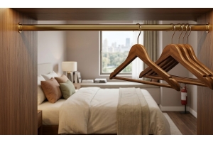 Cintres d'hôtel de luxe : quels cintres choisir pour une garde-robe à la hauteur des exigences ?
